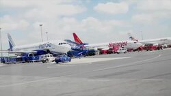 POV of BH Air, SpiceJet and Indigo airplanes on the tarmac preparing for take off at the domestic departure of Delhi Airport Stock Footage