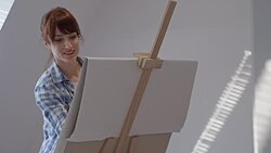 Woman artist drawing in art studio Stock Footage