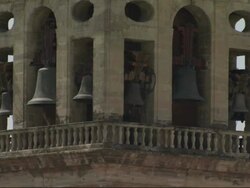 Medium static - Several bells hang in the Cordoba Church bell tower. / Cordoba, Spain Stock Footage