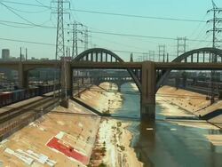 ZO, WS, 6th Street Bridge viaduct above Los Angeles River concrete flood control channel, Los Angeles, California, USA Stock Footage