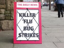 Newspaper Headline Baord - Killer 'Flu bug strikes Stock Footage