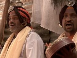 Men singing and playing instruments at ritual Stock Footage