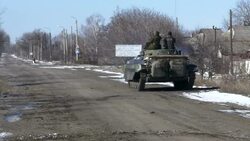 Rebel military vehicle in Debaltseve driving away News Clip