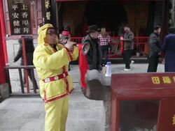 MS PAN Villagers performing trumpet in temple fair during chinese spring festival  AUDIO  / tongchuan, shaanxi, china Stock Footage