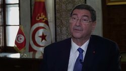 Interview with Tunisian Prime Minister Habib Essid about the terror attack on beach arrests, tourism and safety in Tunisia. News Clip