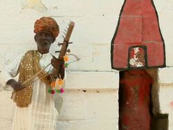 MS, Street performer at Jaisalmer Fort, Jaisalmer, Rajasthan, India Stock Footage