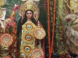 MS PAN Statues and aarti ceremony at Durga Puja celebration / Kolkata, West Bengal, India Stock Footage