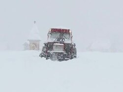 HD SLOW-MOTION: Tractor with plow in snowfall Stock Footage