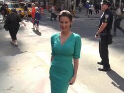 America Olivo (Baby Quest spokeswoman) poses for the press outside NASDAQ, where she rang the opening bell in New York, NY, on 8/14/13. (Getty Images Entertainment Video) Stock Footage