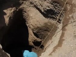 MS ZI TU Woman lifting bucket near well / Todonwang, Turkana, Kenya Stock Footage