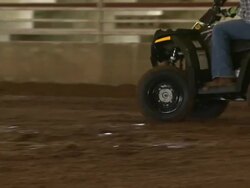 Shot of child circling around a course in an ATV. Stock Footage