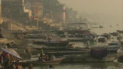 Rowboats crowd a river during India's Diwali celebration. Stock Footage