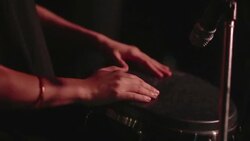 close up of human hand playing drum at party night club Stock Footage