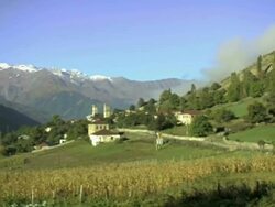 WS PAN View of Lanjeri village near Mestia with snowy mountains / svaneti, Georgia Stock Footage