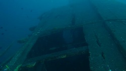 Shipwreck in fishing village Stock Footage