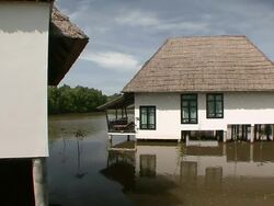 MS Tropical resort villa sitting on pillars over river / Sihanoukville, Cambodia Stock Footage