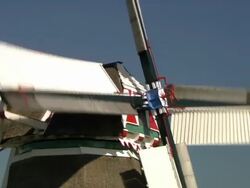 Typical dutch windmill in a polder, the Netherlands Stock Footage