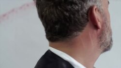 Artist thinking in front of his painting Stock Footage