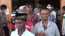 CLEAN : Rescued migrants are relocated by Indonesian authorities News Clip