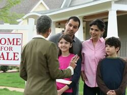 WS DS Family Having Discussion with Realtor in Front of New Home For Sale / Richmond, Virginia, USA Stock Footage