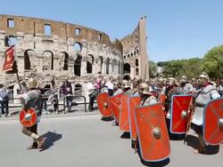 MS TS Shot of Costumes parade for the anniversary of the birth of Rome, also knowns as "Natale di Roma" People dressed as ancient romans and gladiators walks along the landmarks of the city / Rome, Italy  Stock Footage