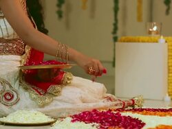 Young woman preparing rangoli in diwali festival Stock Footage