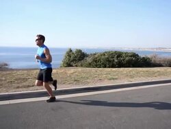 A man going for a run.  - Slow Motion Stock Footage