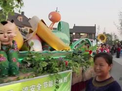 WS People wearing colorful costumes and parade float/xian,shaanxi,China Stock Footage
