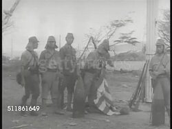 1942: WAINWRIGHT SURRENDERS: SOT US Commander Jonathan Wainwright IV making surrender announcement: VS Japanese lowering US Flag, Japanese flag raising on pole. Jonathan Wainwright & many soldiers walking. Asian children watching from roadside. Instructional Video