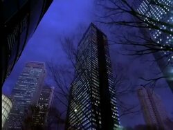 Wide low angle view Shinjuku west side buildings at night, Tokyo, Japan Stock Footage