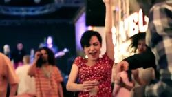 Friends dance at outdoor rock concert in downtown Las Vegas Stock Footage