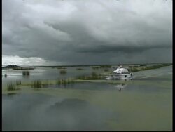 Motor boat sailing in Lake Titicaca, WA, Peru Stock Footage