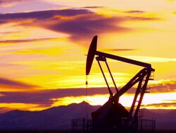 HD: Oil Pump Silhouette at Sunset Stock Footage