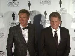 Ryan O'Neal and Lawrence Piro at John Wayne Cancer Stock Footage