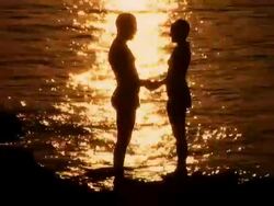 HD: Young Couple At Sunset Stock Footage