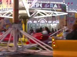 Lake Tahoe carnival Mardi Gras amusement ride Stock Footage
