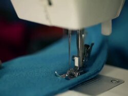 Macro shot of man working with sewing machine Stock Footage