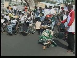 Disabled rally against peace accord News Clip