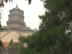 WA pan left across from forest to Summer Palace, Beijing, China Stock Footage