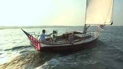 A couple sails their Morris Yachts M36 through Narragansett Bay near Newport. Stock Footage