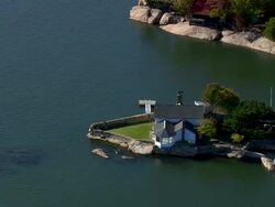 MS AERIAL TU ZI View of houses surrounded by tree at Thimble Islands / Connecticut, United States Stock Footage