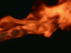 HD Super Slow-Mo: Flame On Black Background Stock Footage