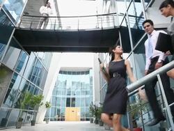Three business people talking  Stock Footage