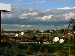 Blank Billboard With Cloud Background and Traffic Wide 1080p24 Stock Footage