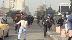 CLEAN : Iraqi security forces advance on protesters in Baghdad's Al-Khilani square News Clip