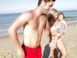 Family Enjoying Beach Holiday Together Stock Footage