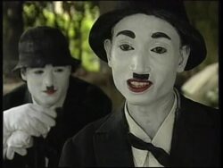 INDIA: BROTHERS HAWK CHARLIE CHAPLIN ACT AROUND NEW DELHI News Clip