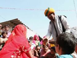 MS Man serving the bride during Indian wedding / Rajasthan, India Stock Footage