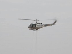 Pararescue jumping from helicopter. Stock Footage