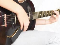 Girl playing acoustic guitar. Stock Footage